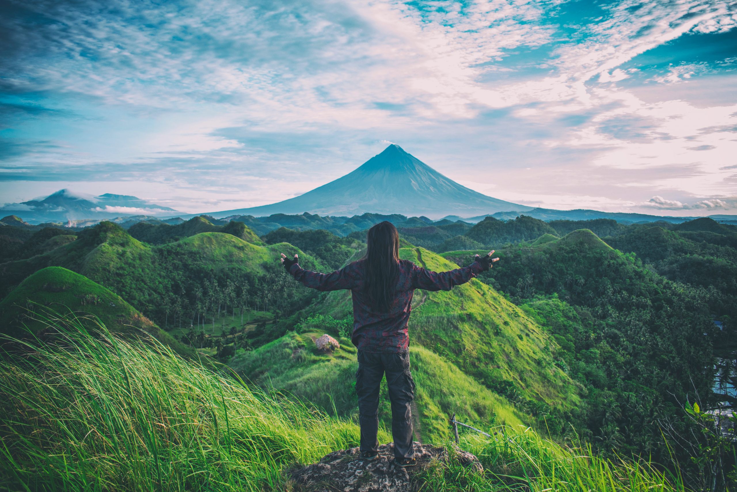 person-standing-on-top-of-hill-705075